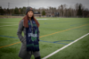 Student wearing a blue and green Lakers scarf